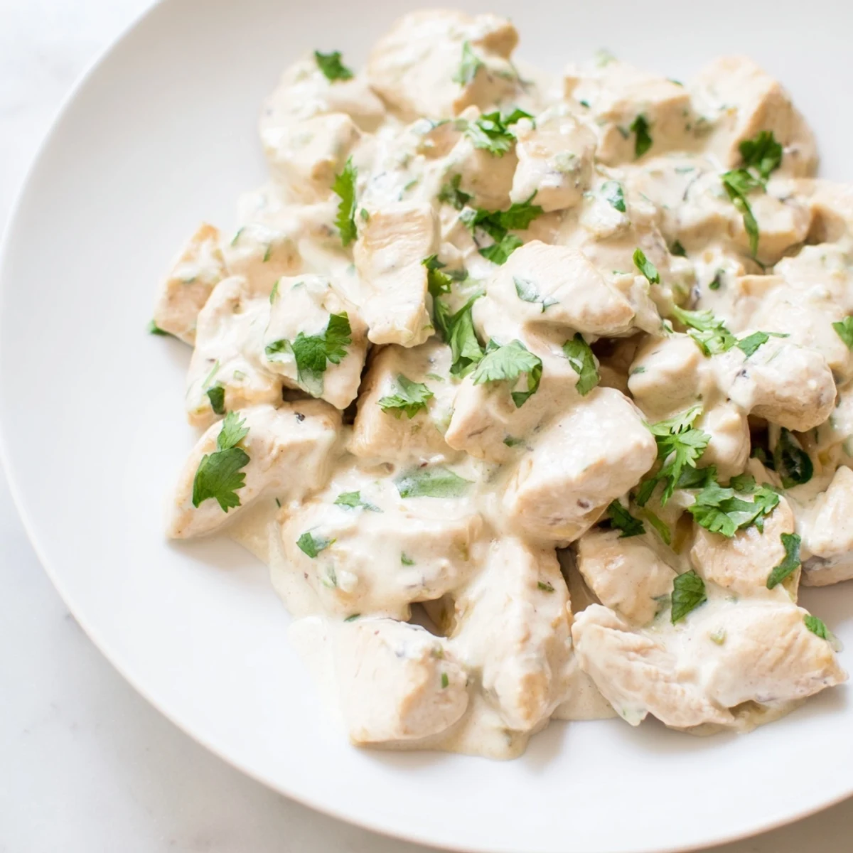 Freshly grilled chicken tossed in zesty jalapeño ranch dressing over crunchy romaine, topped with shredded cheddar and crispy tortilla strips.