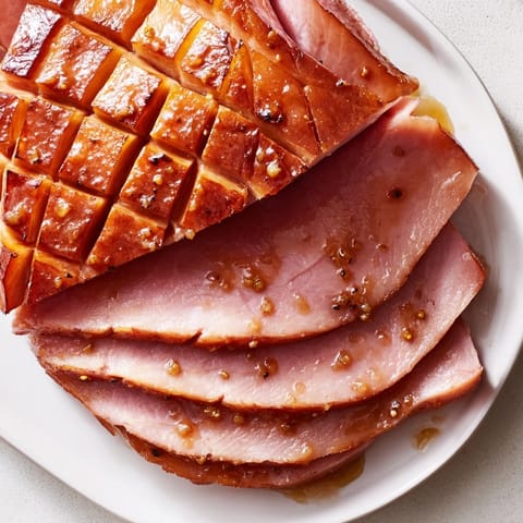 Slow-cooked to perfection, this Honey Glazed Ham boasts a sweet and savory spiced honey flavor.